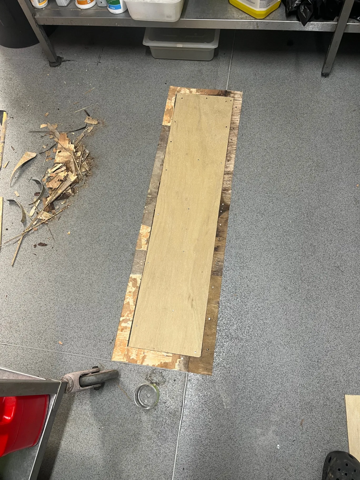 During — commercial kitchen sub-floor and safety vinyl plank repair