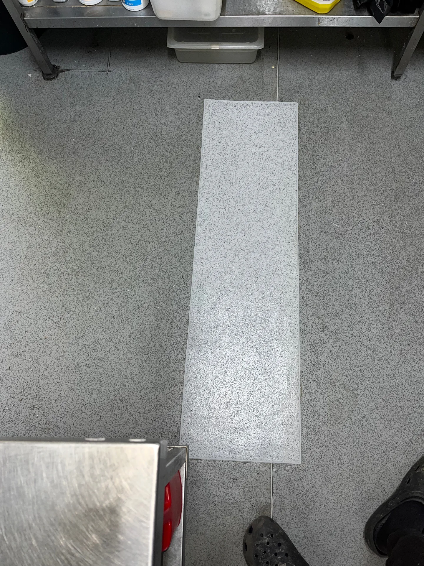 After — commercial kitchen sub-floor and safety vinyl plank repair