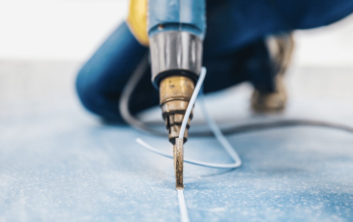 Hot-welding a seam on commercial safety vinyl