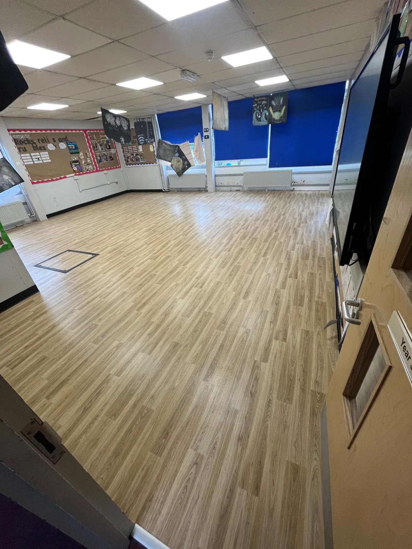 Commercial safety vinyl flooring being hot-weld repaired